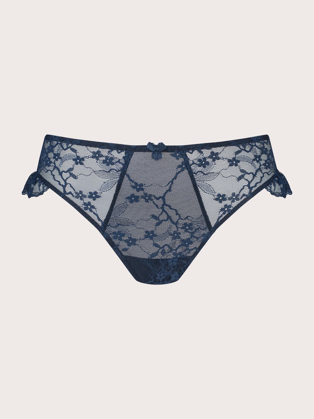 Navy blue lace panties with floral lace patterns and ruffle side details, displayed flat against a light beige background.