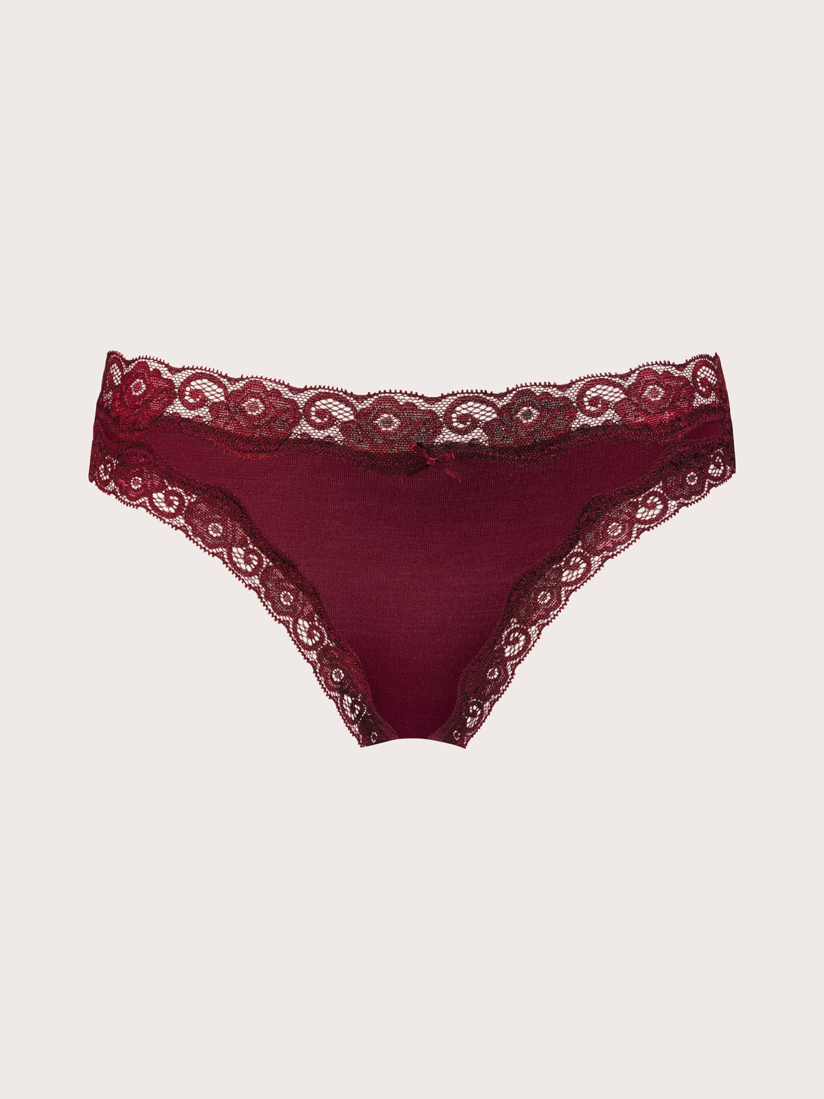 A pair of burgundy lace-trimmed panties with a solid burgundy fabric body, displayed flat against a light off-white background.